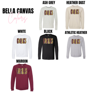 Bella Canvas Eagles graphic tops shown in ash grey, heather dust, white, black, athletic heather, and maroon color options for Silver Lake Eagles spirit wear