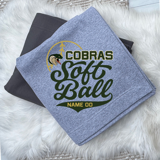 Jackson Heights Cobras Softball custom stadium blanket in grey with green and gold team graphics folded on white faux fur background