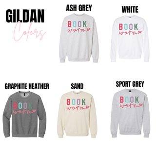 Book Worm graphic sweatshirt on Gildan crewneck in ash grey, white, graphite heather, sand, and sport grey color options