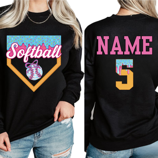 Black top featuring a Softball ice cream drip varsity graphic on the front and optional personalized name and number on the back in bold varsity lettering.