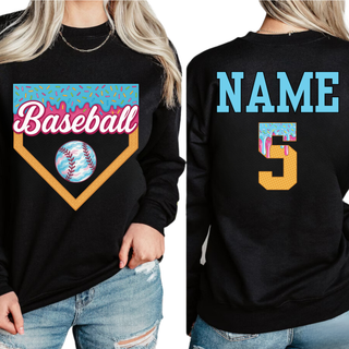 Ice cream baseball home plate graphic on front with customizable name and number on back shown on a black Gildan crewneck top.
