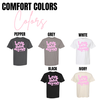 Love Them Anyway Luke 23:34 Christian graphic top comfort colors with pink lettering.