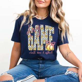 Navy any game day softball bow graphic shirt with checker pattern lettering and softball bow design styled with denim shorts