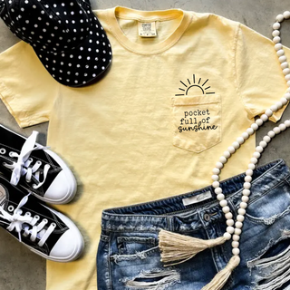 Pocket Full of Sunshine yellow Comfort Colors pocket graphic tee with sun design styled with denim shorts and sneakers