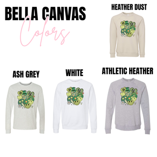 Lucky shamrock smiley graphic sweatshirt Bella Canvas color options: Heather Dust, Ash Grey, White, Athletic Heather