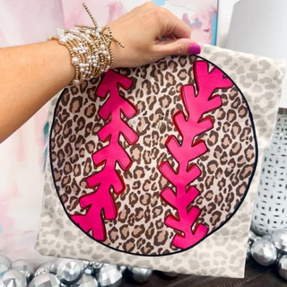 Leopard print softball graphic with bright pink stitches on neutral top