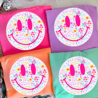 Floral smiley spring graphic top in pink purple orange and green pastel color options