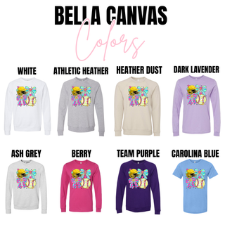 softball bow helmet graphic apparel shown on bella canvas styles including long sleeve crewneck and tee in multiple colors
