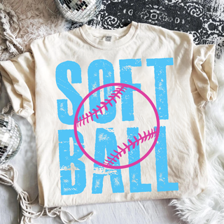softball graphic top with blue distressed soft ball text and pink softball design on cream shirt