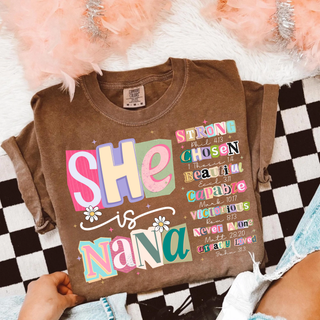 she is nana christian graphic top with colorful bible verse affirmations printed on brown shirt