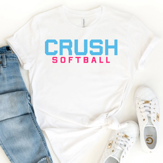 Crush Softball blue and pink lettering graphic top on white shirt styled with jeans and sneakers