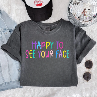 happy to see your face graphic top with colorful lettering on dark grey shirt styled with denim and accessories