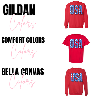 distressed USA stars patriotic graphic shown on Gildan Comfort Colors and Bella Canvas apparel including crewneck short sleeve and long sleeve options