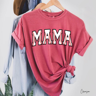 Crimson graphic top on a hanger with rolled sleeves featuring varsity-style MAMA lettering with red baseball stitch detail inside each letter and a black outline
