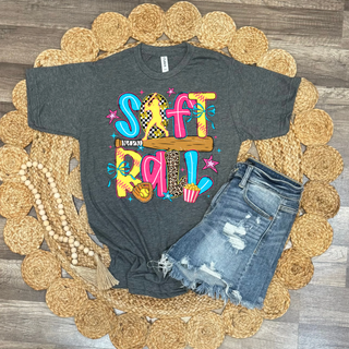 charcoal softball graphic top with colorful SOFTBALL lettering, bat, bow, glove, popcorn, and leopard print accents