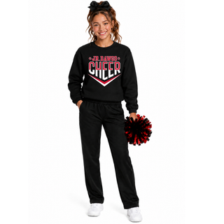 cheer athlete wearing black crewneck sweatshirt with red and white Jr Dawgs Cheer classic logo with chevron holding red and black pom poms

