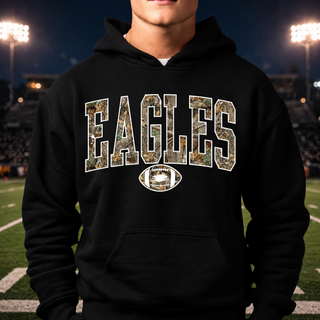 Model wearing a black hoodie featuring the Silver Lake Eagles Football Realtree camo Eagles graphic.