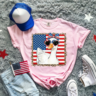 Blossom Comfort Colors tee with patriotic goose American flag leopard border heart sunglasses design front view