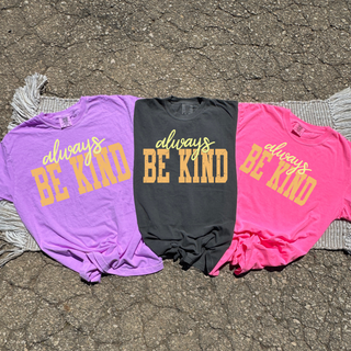 Always Be Kind graphic tee shown in violet, pepper, and neon pink Comfort Colors
