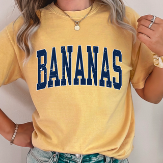 Mustard short sleeve tee with distressed navy varsity block letter Bananas Baseball graphic