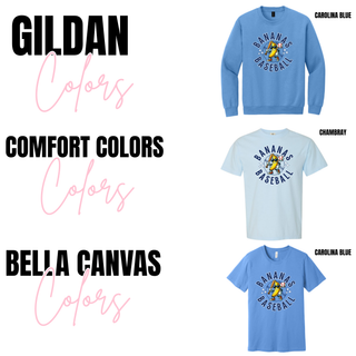 Batter Up Banana Circle Blue Graphic Top shown on Gildan carolina blue crewneck, Comfort Colors chambray tee, and Bella Canvas carolina blue tee