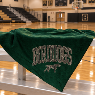 Forest green Birddogs Basketball stadium blanket with camo arch BIRDDOGS lettering and a bird dog mascot displayed on gym bleachers