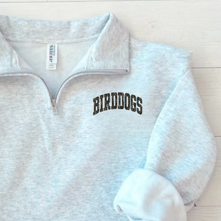 Birddogs Basketball Distressed Arch Fleece Quarter-Zip close up detail in Ash Grey showing camo BIRDDOGS lettering on chest