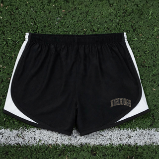 Birddogs Basketball Distressed Arch Women's Cadence Performance Shorts in Black with white trim, flat lay showing distressed camo BIRDDOGS lettering in a varsity arch near the hem