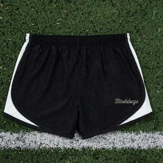 Birddogs Basketball Script Women's Cadence Performance Shorts in Black with white trim, flat lay showing camo Birddogs script lettering near the hem
