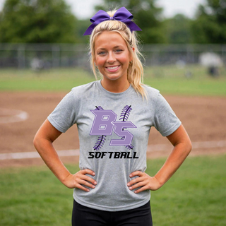 Woman wearing an athletic heather Bomb Squad Lace Up Softball top with purple BS monogram