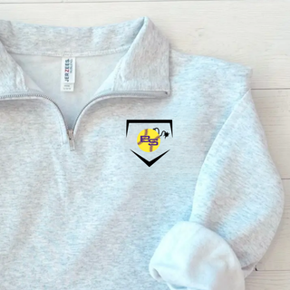 Close-up of Bomb Squad Softball Home Plate Crest artwork on the ash grey cadet quarter-zip pullover