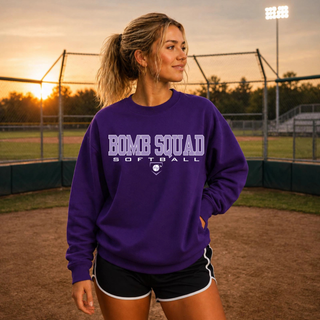 Bomb Squad Softball logo on the front chest of a purple crewneck