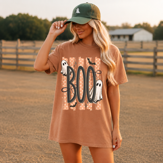 Woman wearing yam Comfort Colors boo spooky striped halloween ghost top with bats and polka dot stripe design
