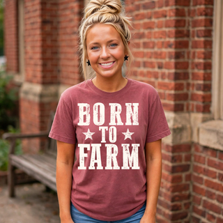Woman wearing crimson Born to Farm graphic tee with distressed vintage star lettering design