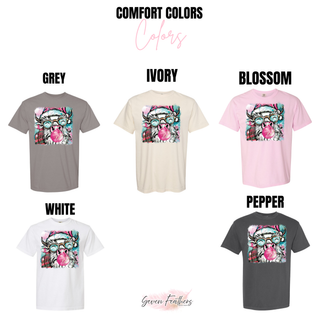 Comfort Colors color chart showing the Highland cow Santa design in Grey, Ivory, Blossom, Pepper, and White