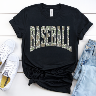 Black Bella Canvas tee with arched camo Baseball varsity graphic flat lay with white sneakers and jeans
