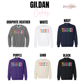 Gildan crewneck color options for the teacher graphic in graphite heather, purple, and sand
