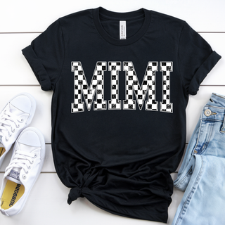 black shirt with checkered mimi text graphic styled with jeans and sneakers