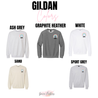 Gildan crewneck swatch showing ash grey, graphite heather, white, sand, and sport grey with pastel rainbow name design
