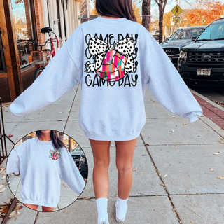 Athletic heather crewneck showing front pocket and back game day volleyball dalmatian bow design, street lifestyle
