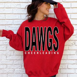 Model wearing red Dawgs Cheer Powerhouse crewneck with Dawgs Cheerleading bold block design against white brick
