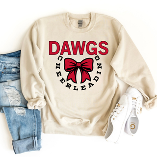 sand crewneck sweatshirt flat lay with jeans and white sneakers featuring red dawgs text, black cheerleading circle text, and red cheer bow design