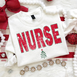 Distressed Red Nurse Christmas top, Nurse in bold distressed red lettering with green outline and a small Christmas tree accent