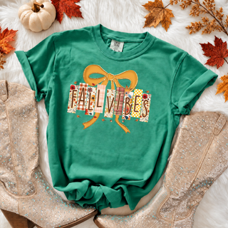 Fall vibes patchwork lettering design with a golden bow on a Blue Spruce Comfort Colors tee