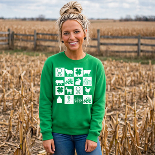 Woman wearing green farm life checkered icons top with ribbon sheep cow pig tractor and farm animal grid design