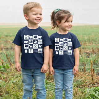 Kids wearing navy farm life checkered icons top with ribbon sheep cow pig tractor and farm animal grid design