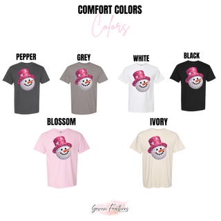Comfort Colors tee color options featuring a snowman with a bright pink faux sequin-style hat.