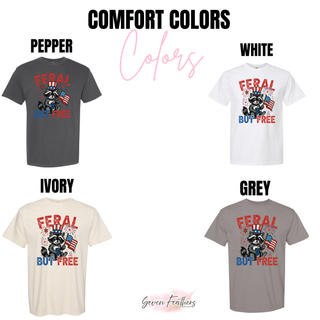 Comfort Colors 1717 feral but free fireworks patriotic raccoon tee in pepper, white, ivory, and grey
