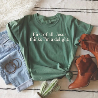 Bay Comfort Colors tee with First of All Jesus Thinks I'm a Delight script design styled with jeans and cowboy boots