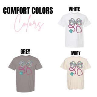 Comfort Colors Floral Bow Stethoscope tops in white, grey, and ivory with colorful floral bow and pink stethoscope design
